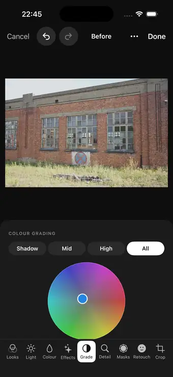 Numa on iPhone: the colour grading wheel under a photograph.